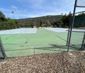 unpaved degraded tennis court